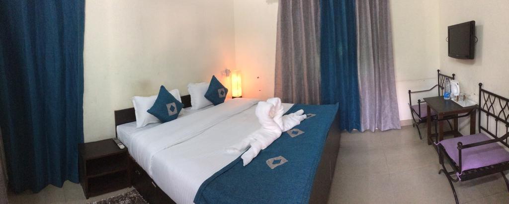 Hotel Sukhsadan Дехрадун Номер фото